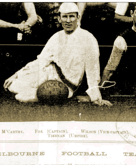VFA field umpire, Mr Tiernan, with a Rugby 'Match' ball (Melbourne Demons team photo, The Australasian, 22 June 1895) 